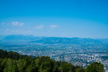 Austria, Panorama landscape mountain nature view from pfaender summit  above tree tops wide view...