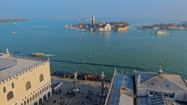 City of Venice in Italy, view above Piazza San Marco square with Doge Palace, Columns of San Marco and San Teodoro and San Giorgio Maggiore Island in the Venetian Lagoon.