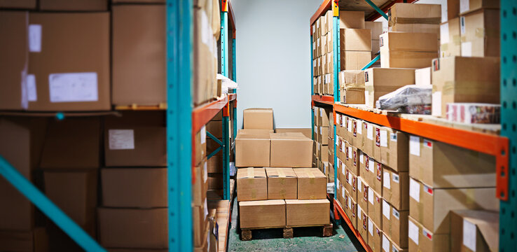 Supply chain, warehouse and box for shipping, delivery and order in wholesale, logistics and cargo production. Ecommerce, distribution and packages, cardboard and parcel in manufacturing factory