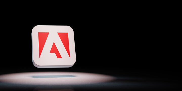 Adobe Inc. App Icon Spotlighted on Black Background