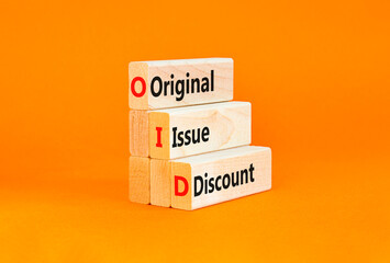 OID original issue discount symbol. Concept words OID original issue discount on beautiful wooden blocks. Beautiful orange background. Business OID original issue discount concept. Copy space.