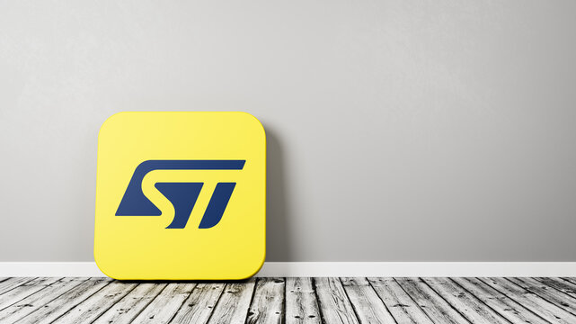 ST Microelectronics App Icon on Wooden Floor Against Wall