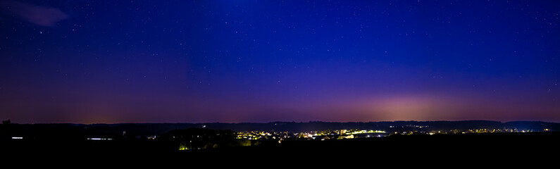  Nightsky with Stars, Moon, and Aurora, Northern Lights over Leiblfing Lower Bavaria Germany.