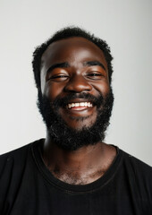 Obraz premium A middle age black african american guy with moustache and beard smiling at the camera grey background