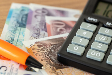 British Pounds, calculator and money file, financial settlements, household budget, taxes, British...