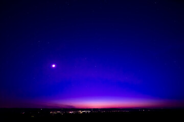 Nightsky with Stars, Moon, and Aurora, Northern Lights over Leiblfing Lower Bavaria Germany.