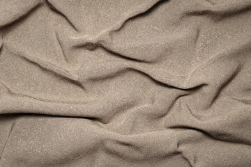 Fabric texture. Wrinkled cotton with folds. Woven cloth. Abstract background