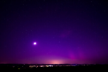Nightsky with Stars, Moon, and Aurora, Northern Lights over Leiblfing Lower Bavaria Germany.