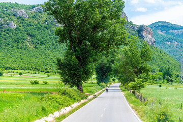 A view down a road in the Gjere mountains, Albania in summertime
