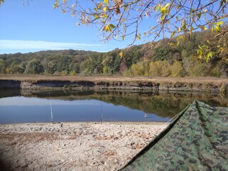 Tourism, camping. Fishing on the river bank. Scenery.