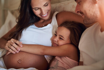 Child, happy family and pregnancy on bed with hug, support and daughter in morning. Parents, girl and love in bedroom for growth, safety and security at home with happiness, smile and excitement