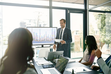 Businessman, discussion and presentation with data on screen for hr metrics review, insights and...