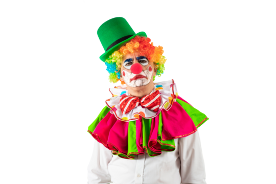 Portrait of creepy clown. Entertainer Joker in colorful suit and wig. Buffoon with clown whiteface makeup. Trickster, jester, pantomime, mime.