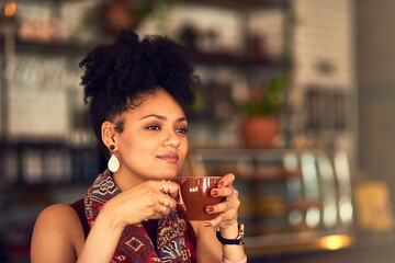 Woman, thinking and drinking espresso at cafe, relax and tea for peace or calm in restaurant. Female person, coffee cup and customer ponder at bistro, beverage and weekend cappuccino for daydreaming