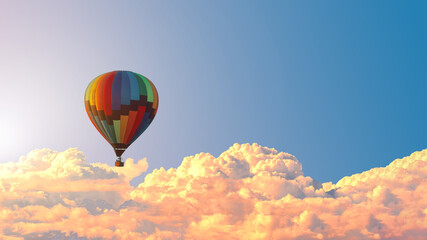 Beautiful peaceful background. Hot air balloon flies very high in blue sky above white clouds, bright sun shines.