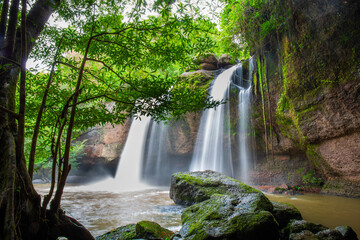 Haew Suwat Waterfall is a waterfall deep in the forest in the middle of a valley in Khao Yai National Park, Nakhon Ratchasima, Thailand.