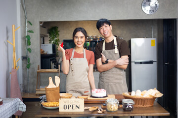 Homemade, happy relaxing and wellness at home. Young asian man and woman preparing birthday cake for friends