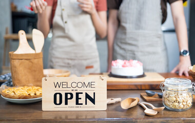 Store open sign. Open on cafe or restaurant on table