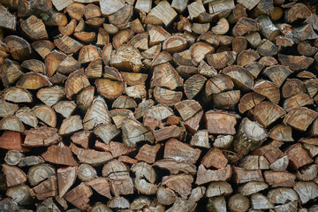 stacked loggs of fire wood texture background