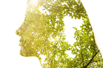 A radiant double exposure profile portrait silhouette of a woman
