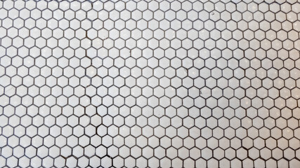 White hexagonal tile pattern background suitable for interior design concepts and modern architecture projects