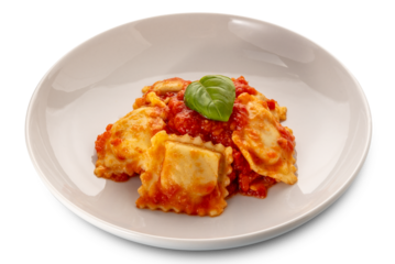 Ravioli with tomato sauce and basil leaf in white plate isolated