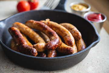 Fried sausages with sauces
