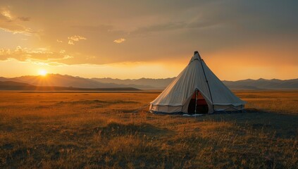 Illustrate the simplicity of travel in Tibet with a minimalist composition of a nomad&rsquo;s tent against the vast expanse of the Tibetan plateau, under the soft glow of the setting sun.