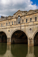 Pulteney Bridge with shop facades over the River Avon in Bath England, Somerset, UK May 30 2024