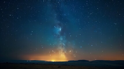 Starry night sky with the Milky Way, viewed from an open field at dusk. There are no light sources but some distant city lights glowing subtly below. Incredibly beautiful, relaxing.