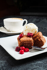 brownie with ice cream and cherries