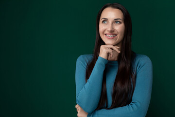 Woman in Blue Shirt Posing for Picture