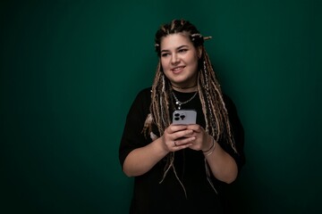 Woman With Dreadlocks Holding Cell Phone