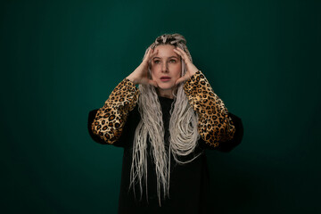 Woman With Long White Hair and Leopard Print Jacket