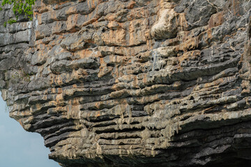 Amazing hillside cliff with compressed layer rock structure or call Pancake rock in the nature geological. 