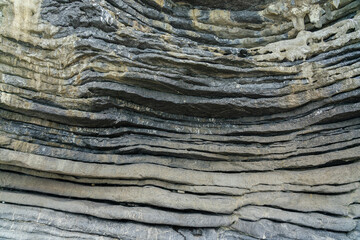 Amazing hillside cliff with compressed layer rock structure or call Pancake rock in the nature...