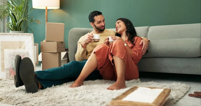 Happy, couple and home or relax with boxes, coffee and people on floor in new house or bonding for relationship. Apartment, together and living room or smile for mortgage, relocation and moving