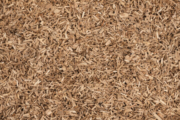 Wooden chips texture background. small wood chips for smoking. sawdust texture. ecological fue