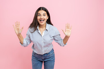 Pleasant surprise Indian woman with raised hands
