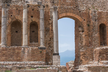 Fototapeta premium Ruins of the ancient Greek theatre with columns, built in the third century BC, Taormina, Sicily, Italy
