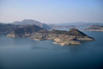 Hills rising above the Mangla dam's Lake, near the famous city of Jhelum in Punjab province of Pakistan.