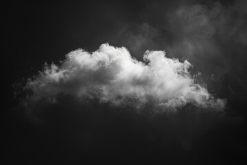 A large cloud in the sky with a dark background