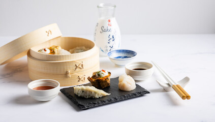 Dim sum steamed in a bamboo basket.
