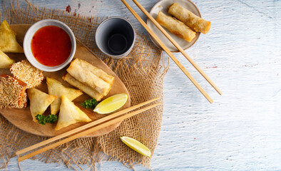 Dim sum, spring roll on a plate.