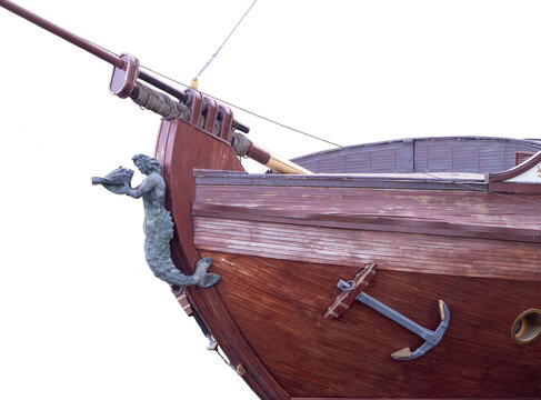 old wooden ship bow with figurehead isolated