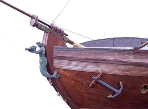 old wooden ship bow with figurehead isolated
