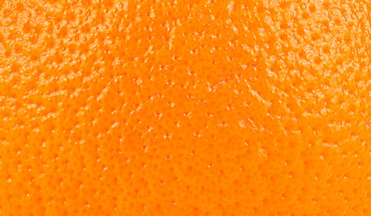 Ripe orange fruit skin as background, citrus fruit.