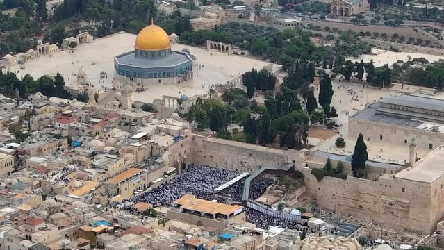 Thousands of Jewish worshippers at priestly blessing, Drone view
Jewish worshippers gather for the Birkat Kohanim (priestly blessing) at the Western Wall in Jerusalem, aerial view,2024
