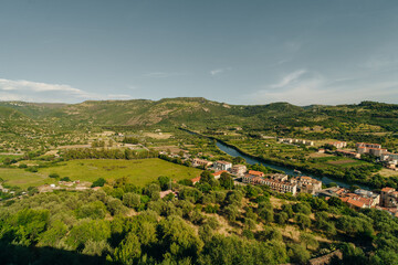 Naklejka premium beautiful village of Bosa with colored houses and a medieval castle. Sardinia, Italy