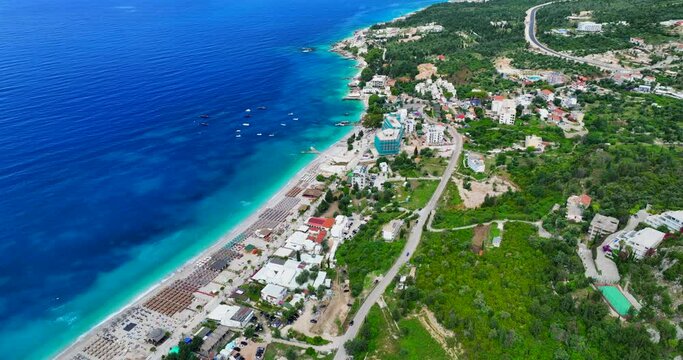 Aerial view of Dhermi beach and the blue Ionian sea in Vlore, southern Albania. 